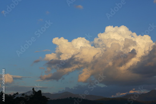 landscape image, large cloud on sky above mountain hill © sutichak