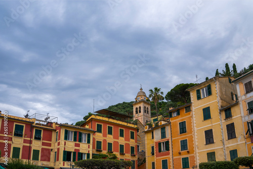 View of old cozy colorful houses in Portofino, Italy. Architecture and landmark of Liguria coast. Postcard of Portofino. Travel and vacation concept. © eskstock