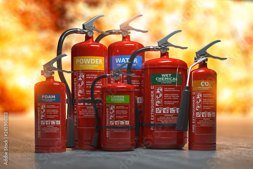 Fire extinguishers on a fire background. Various types and different sizes of extinguishers. 3d illustration