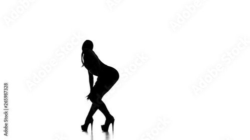 black silhouette on white background girl dancing modern dance, strip plastic