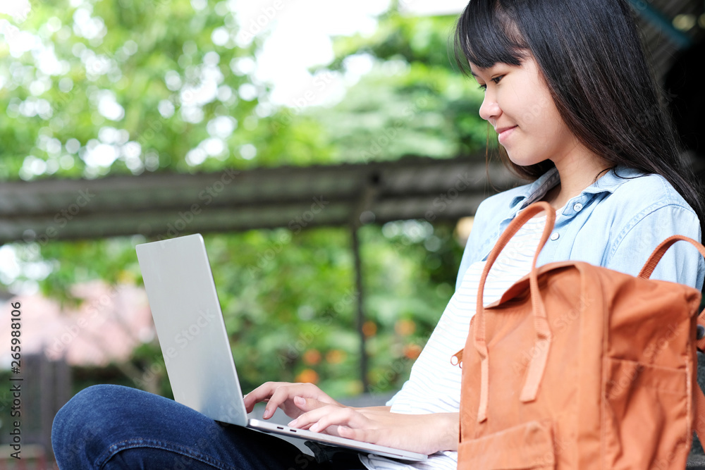 Asian student girl using laptop computer, online education, adult learning concept Asian student girl using laptop computer, online education, adult learning concept