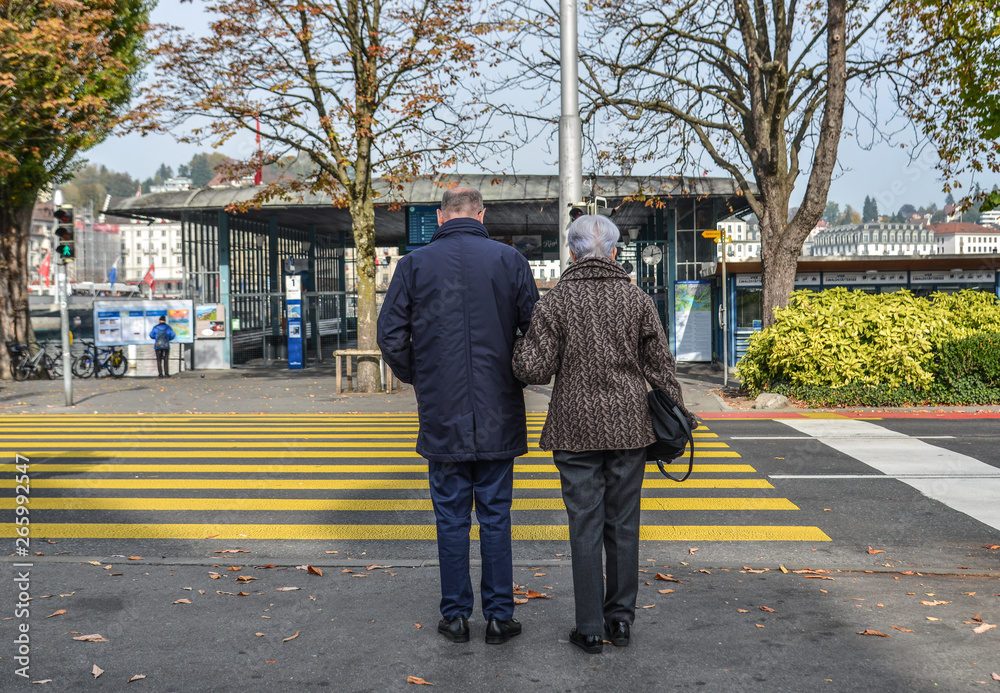 People walking on the street of Lucerne People walking on the street of Lucerne