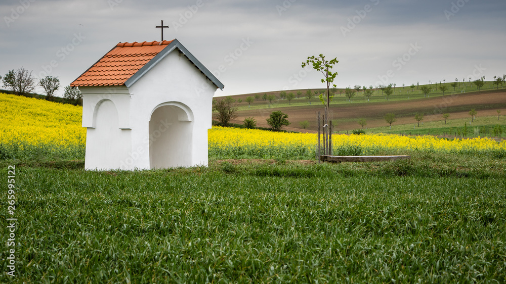 Small chapel in countryside. Calm and peaceful place for all passers-by.