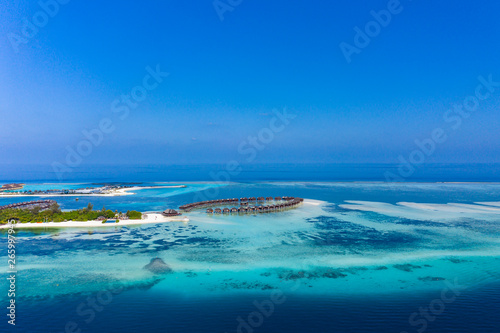 Aerial view, lagoon of Maldives island Olhuveli with Waterbungalows, South Male Atoll, Maldives