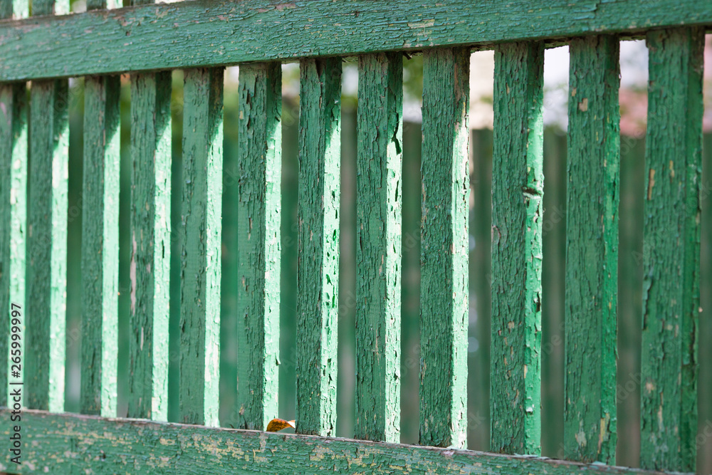 texture of an old green fence from a fence close up texture of an old green fence from a fence close up