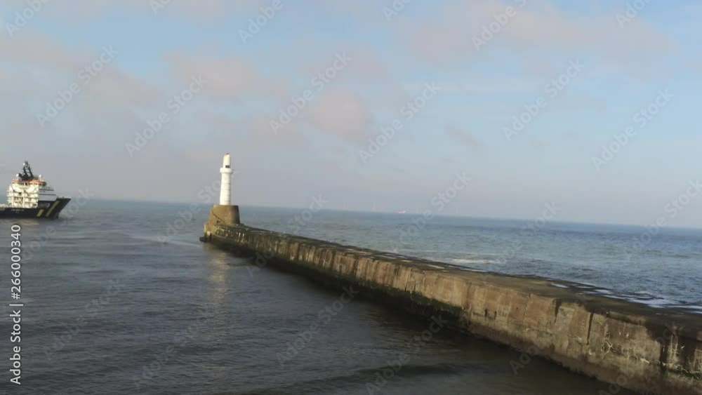 Aberdeen Lighthouse in front of Blue Sky and Clouds Aberdeen Lighthouse in front of Blue Sky and Clouds