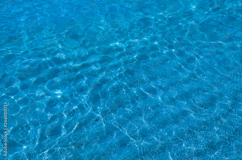 blue surface water in swimming pool
