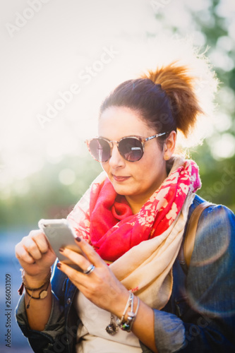Young woman using mobile phone. © Antonio Gravante