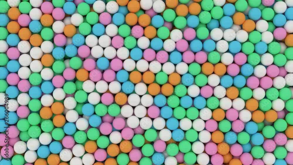 Animated bottom view and flying over pile of a lot of white, green, pink, blue and orange ping pong or table tennis balls lying in large container or as if moving on conveyor belt. Animated bottom view and flying over pile of a lot of white, green, pink, blue and orange ping pong or table tennis balls lying in large container or as if moving on conveyor belt.
