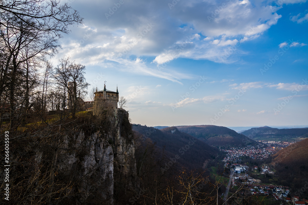 Germany, Popular lichtenstein castle on abrupt cliff of swabian jura above village in vale