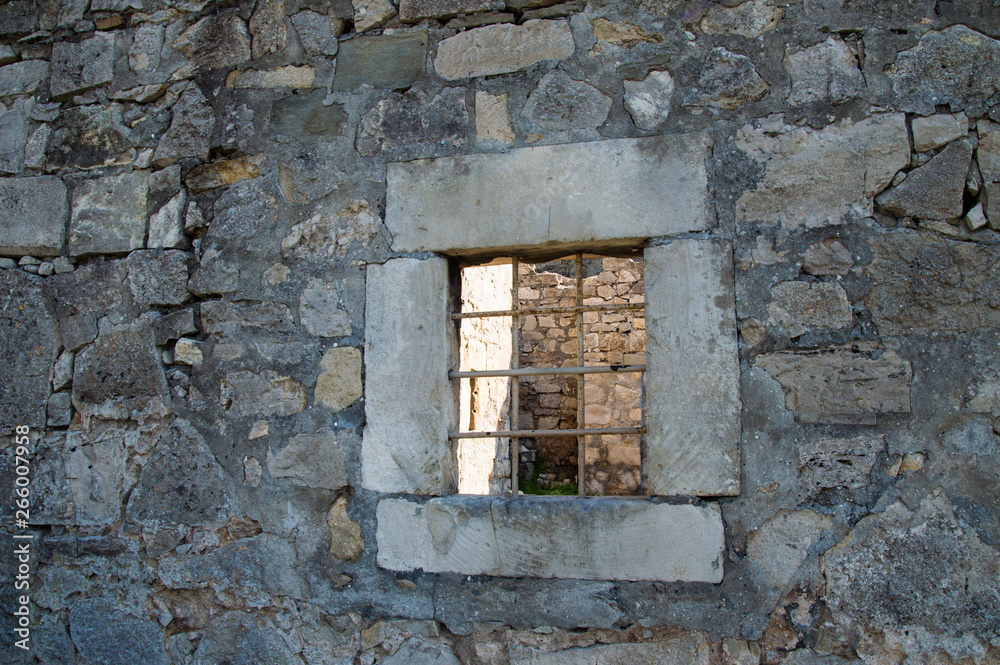 old window in stone wall