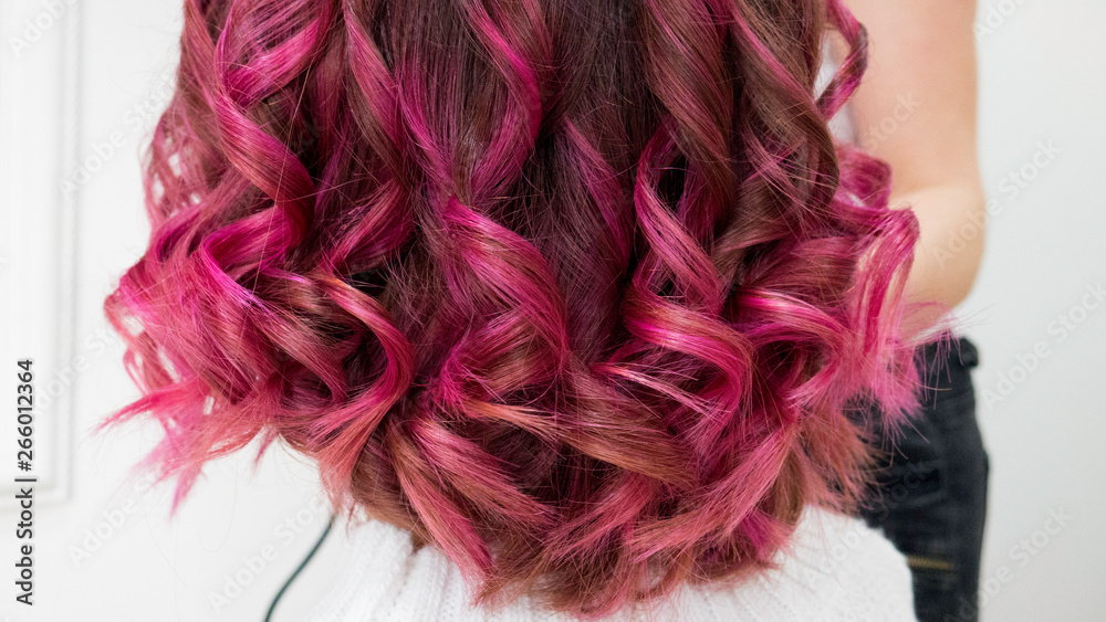 Naklejka premium Healthy curly pink-purple hair 