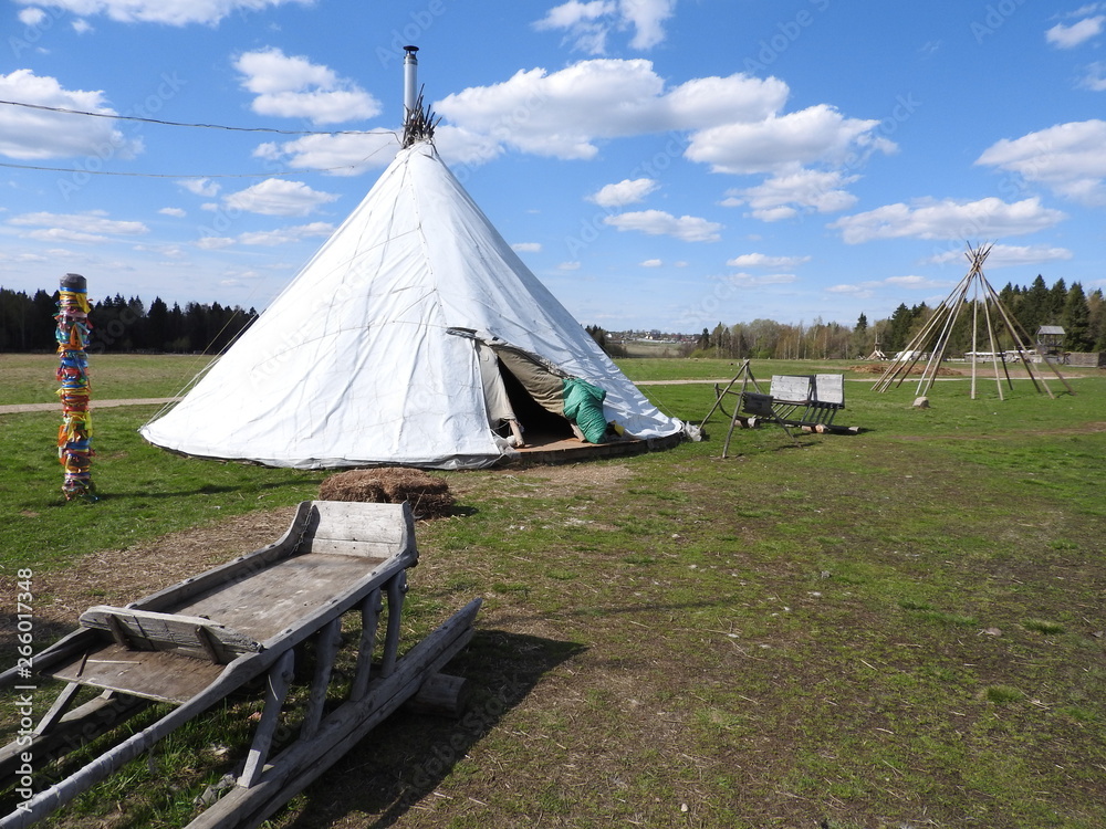 Nenets herders hut for the summer on a meadow, on a clear day