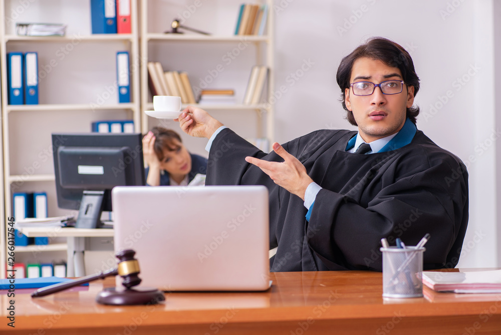 Two lawyers working in the office Two lawyers working in the office