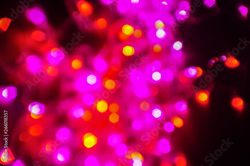 Bokeh abstract texture. Colorful. Defocused background. Blurred bright light. Circular points