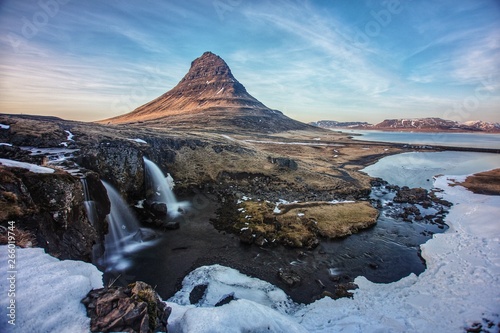 The Mount Kirkjufell of Iceland, captured at the sunset with long exposure