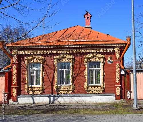 Wooden house with a decorative facade in Kolomna. Russia, Kolomna, April 2019.