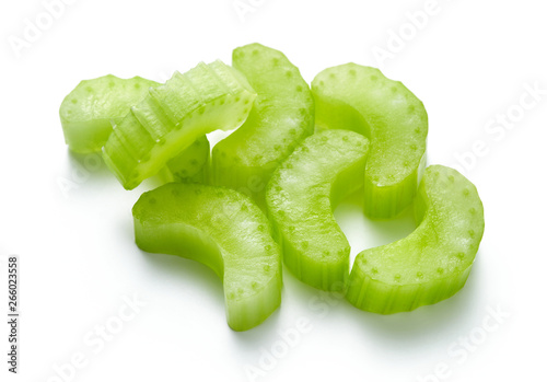 choped green celery sticks isolated on white background