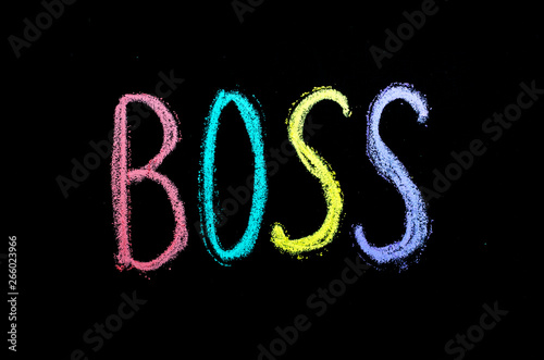 word "boss" hand drawn on blackboard