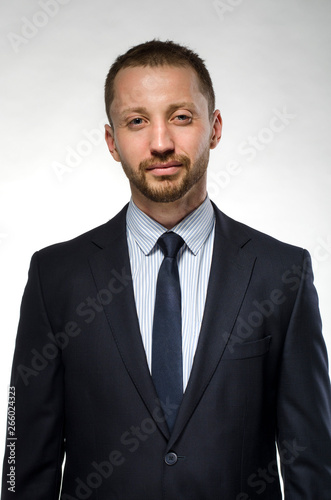 Portrait of confident business man isolated over white background