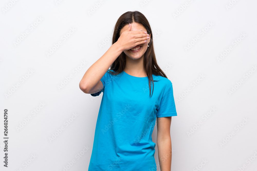 Teenager girl with blue shirt covering eyes by hands. Do not want to see something Teenager girl with blue shirt covering eyes by hands. Do not want to see something