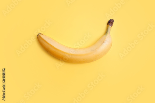 Yellow banana on a yellow background, still life minimalism. Healthy diet