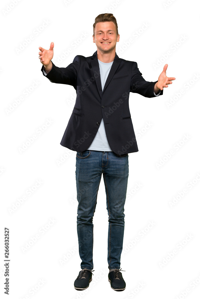Blonde handsome man presenting and inviting to come with hand Blonde handsome man presenting and inviting to come with hand