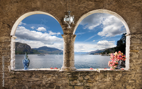 Bifora con veduta sul lago di Como photo