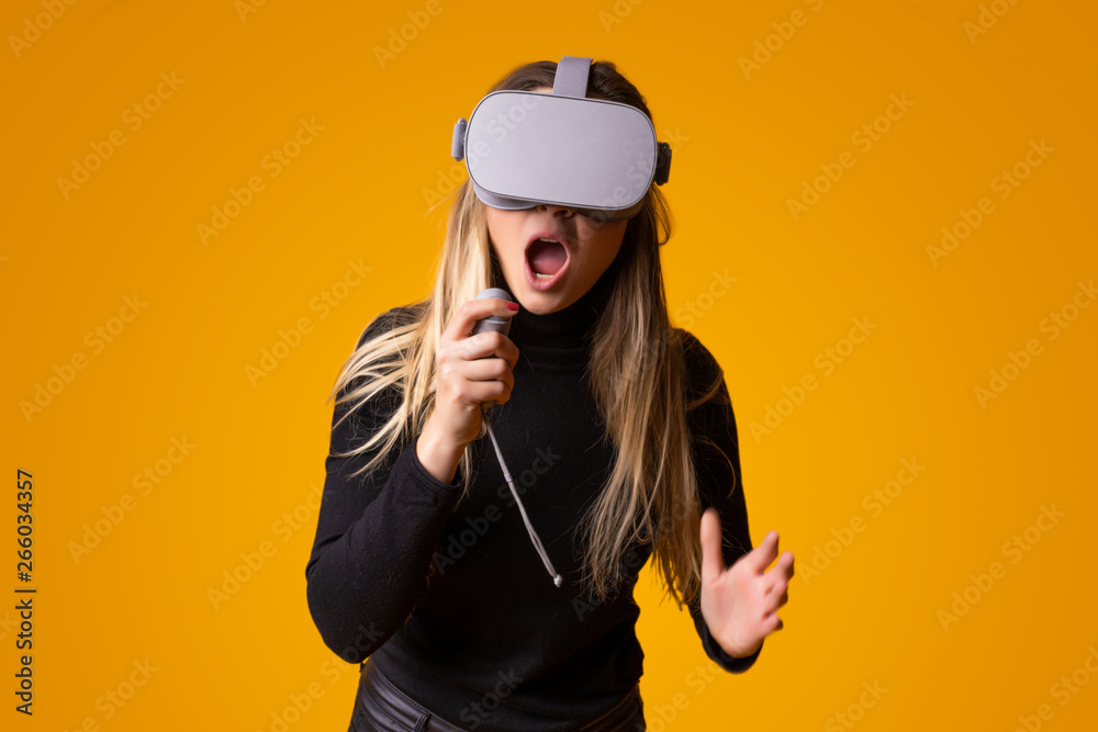 young girl with surprise face using virtual reality glasses young girl with surprise face using virtual reality glasses