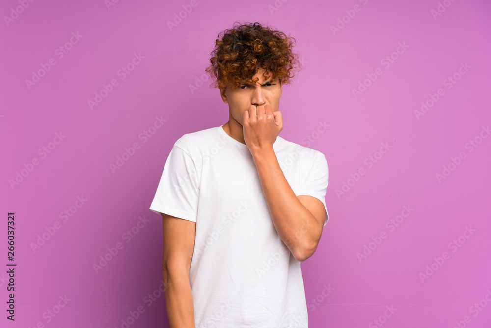 Young african american man over isolated purple wall having doubts Young african american man over isolated purple wall having doubts