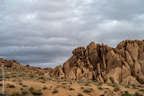 California desert landscape overcast sky above rock formations of the Alabama Hills in the Sierra Nevada