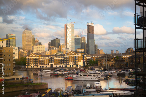London, UK. Canary Wharf at sunset and Lime house marina with boats