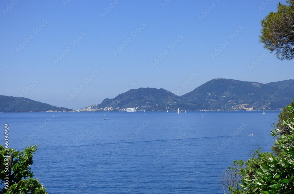 A view of the Bay of Poets in Liguria Italy with mountains in the background