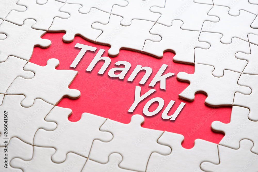 Thank you word reveal under jigsaw puzzle Thank you word reveal under jigsaw puzzle