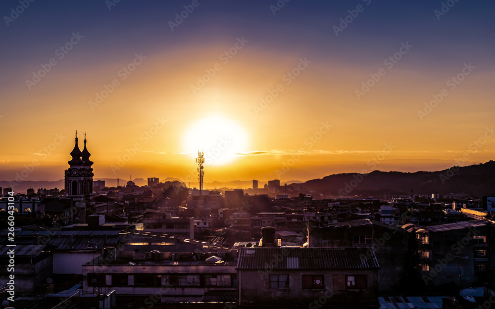 Beautiful golden sunrise over the downtown of Ibague