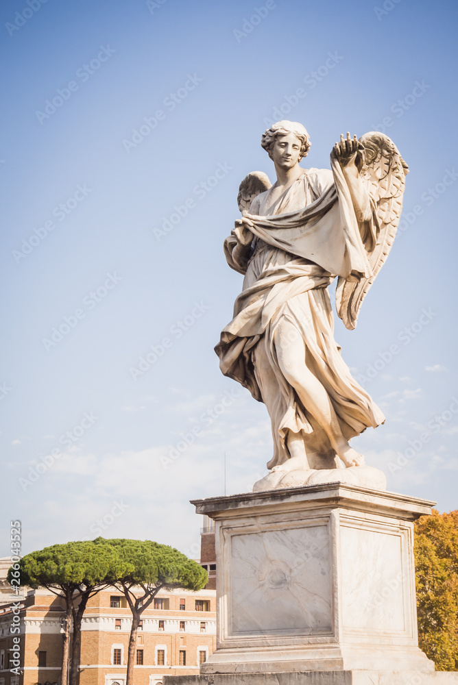 Angel statue on the blue sky of Rome