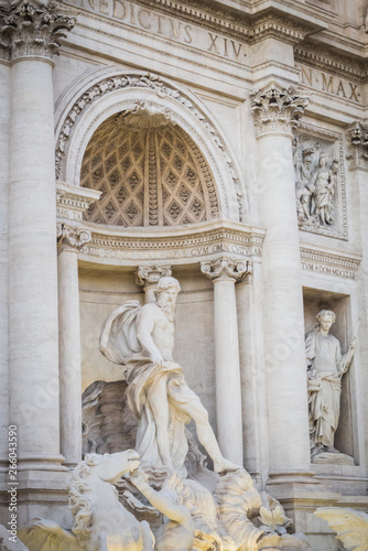 Statues on the Trevi Fountain at the end of the day in Rome