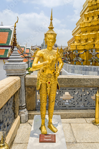 Statue of a Theppaksi in Wat Phra Kaew, the Temple of the Emerald Buddha, within the Grand Palace in Bangkok photo