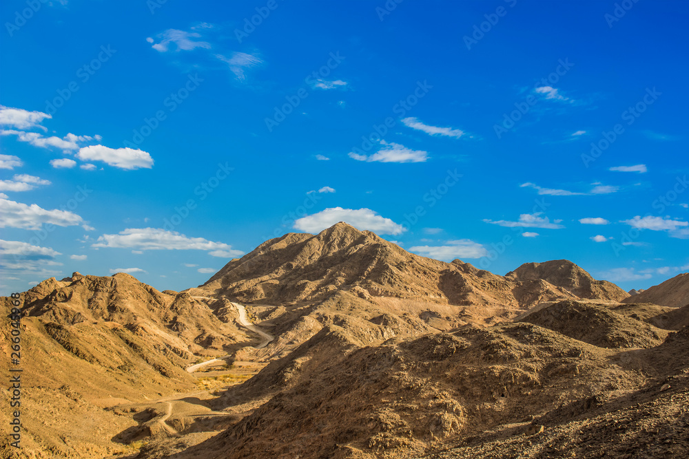 dry sand stone mountains in desert dunes scenic landscape environment 