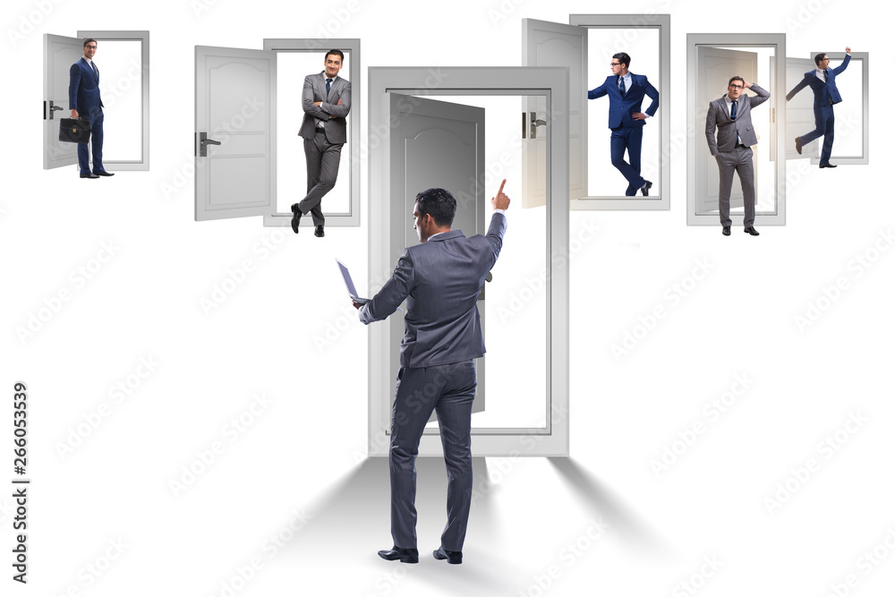 Fototapeta premium Businessman in uncertainty concept with many doors