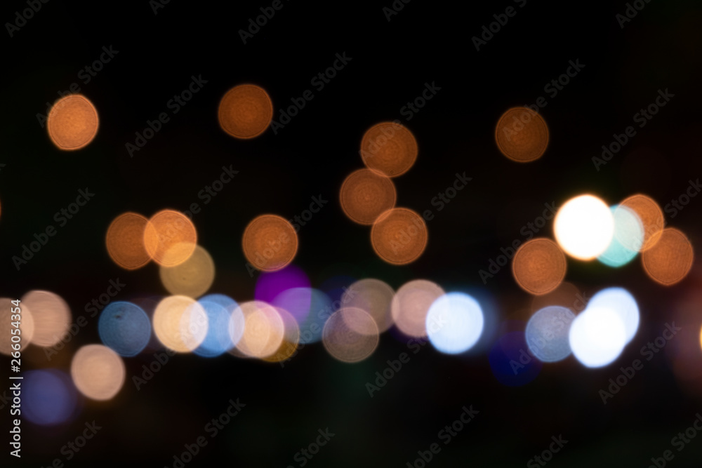 Fototapeta premium The light that blurts out is a beautiful Bokeh on a black background.