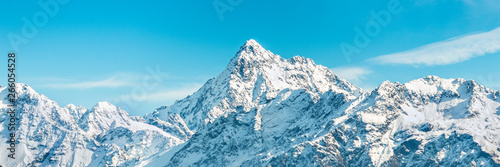 mountains in winter, snow capped peaks mountain background © Joshua
