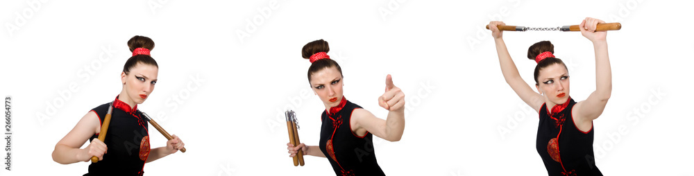 Obraz premium Funny woman with nunchucks isolated on white