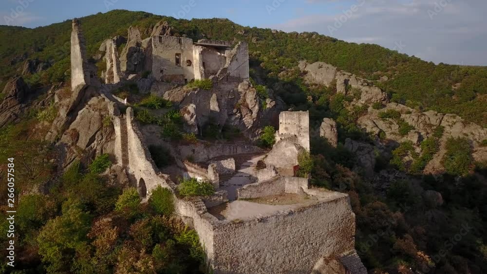 Aerial circling and fly over view of medieval Durnstein castle ruin and town in Wachau valley Lower Austria along the river Danube Aerial circling and fly over view of medieval Durnstein castle ruin and town in Wachau valley Lower Austria along the river Danube