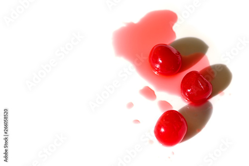 Maraschino cherry on white background - isolated