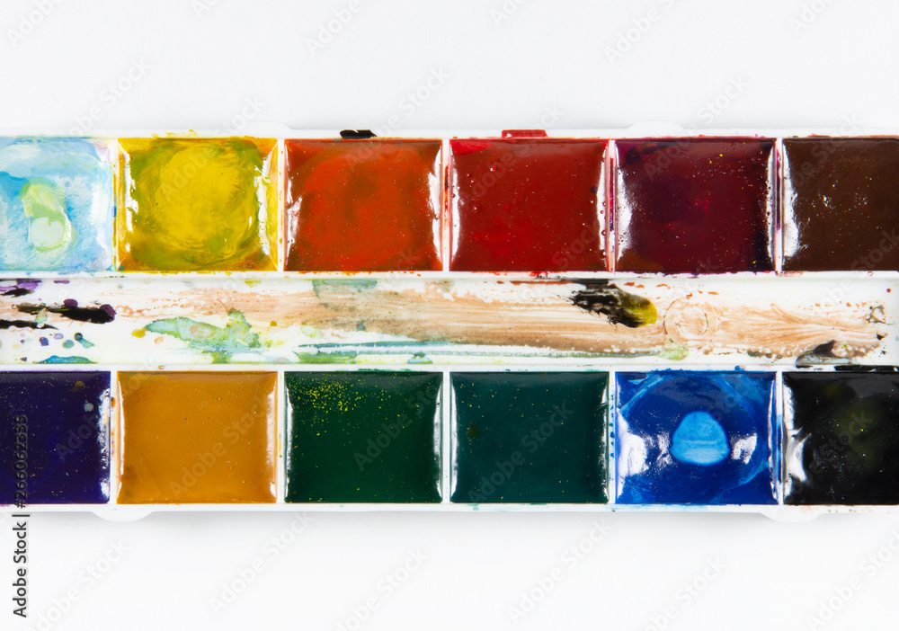 A set of children's paints in rectangular forms close-up