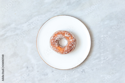 Finnish traditional Vappu food 1st of May, sugar donuts with sima on marble background with copy space