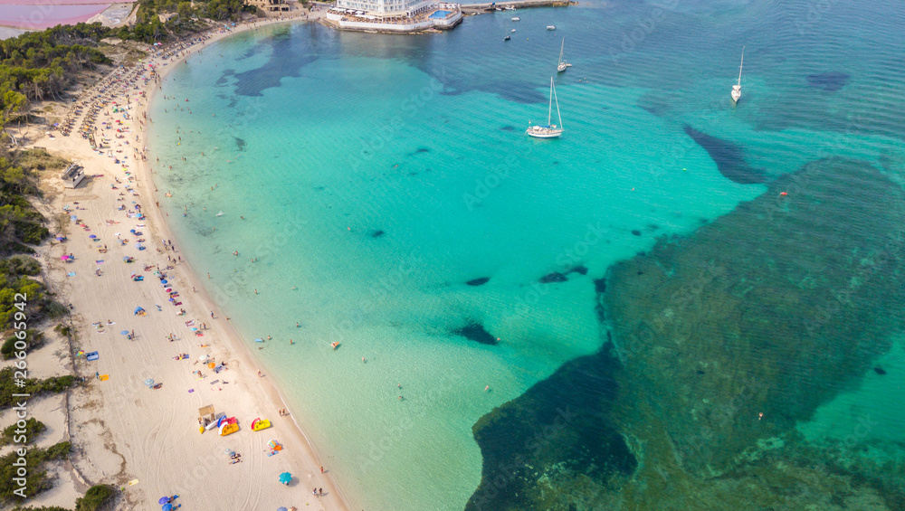 Colonia Sant Jordi, Mallorca Spain. Amazing drone aerial landscape of the charming Estanys beach and the boats with a turquoise Caribbean sea