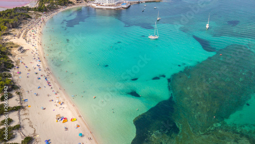 Colonia Sant Jordi, Mallorca Spain. Amazing drone aerial landscape of the charming Estanys beach and the boats with a turquoise Caribbean sea