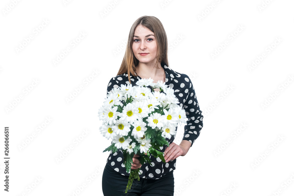 woman holds out a bouquet of flowers woman holds out a bouquet of flowers
